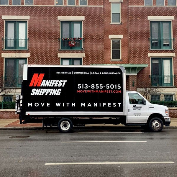 manifest shipping moving truck with company details on it